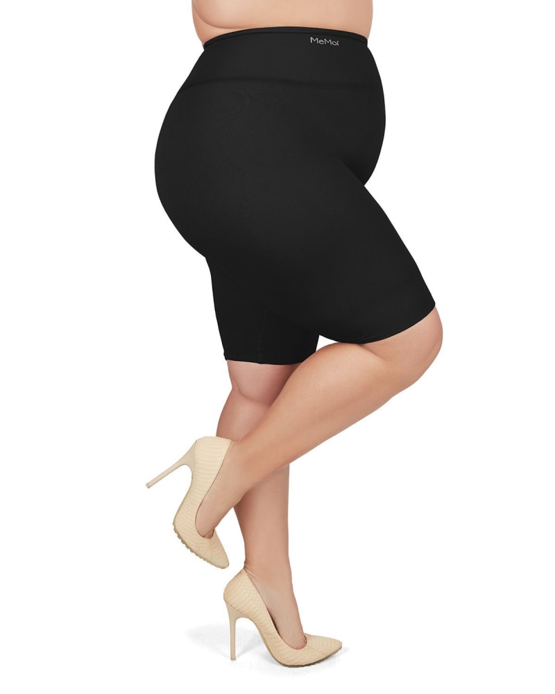 Side of a model wearing a size L BodySmootHers Dual Layer High Waisted Thigh Shaper in Black by Memoi. | dia_product_style_image_id:299809